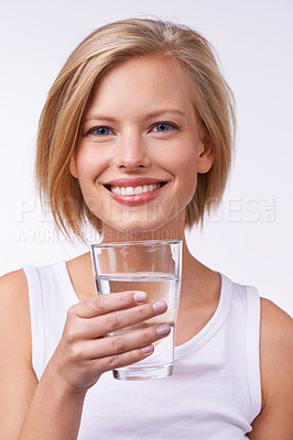 Buy stock photo Drinking water, portrait and happy woman for wellness, nutrition and hydration in studio against white background. Detox, female person or model and healthy lifestyle for diet and weight loss.