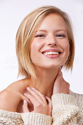 Buy stock photo Studio portrait of a beautiful smiling woman in a sweater