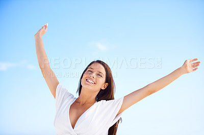 Buy stock photo Blue sky, smile and woman on holiday with freedom, happy adventure and sunshine in Greece. Summer, sun and face of girl stretching arms for energy, wellness and outdoor travel vacation in nature.