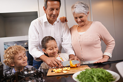 Buy stock photo Food, grandparents or happy kids learning cooking skills for a healthy dinner with fruit or vegetables at home. Teaching, child development or grandmother with old man or meal nutrition in kitchen