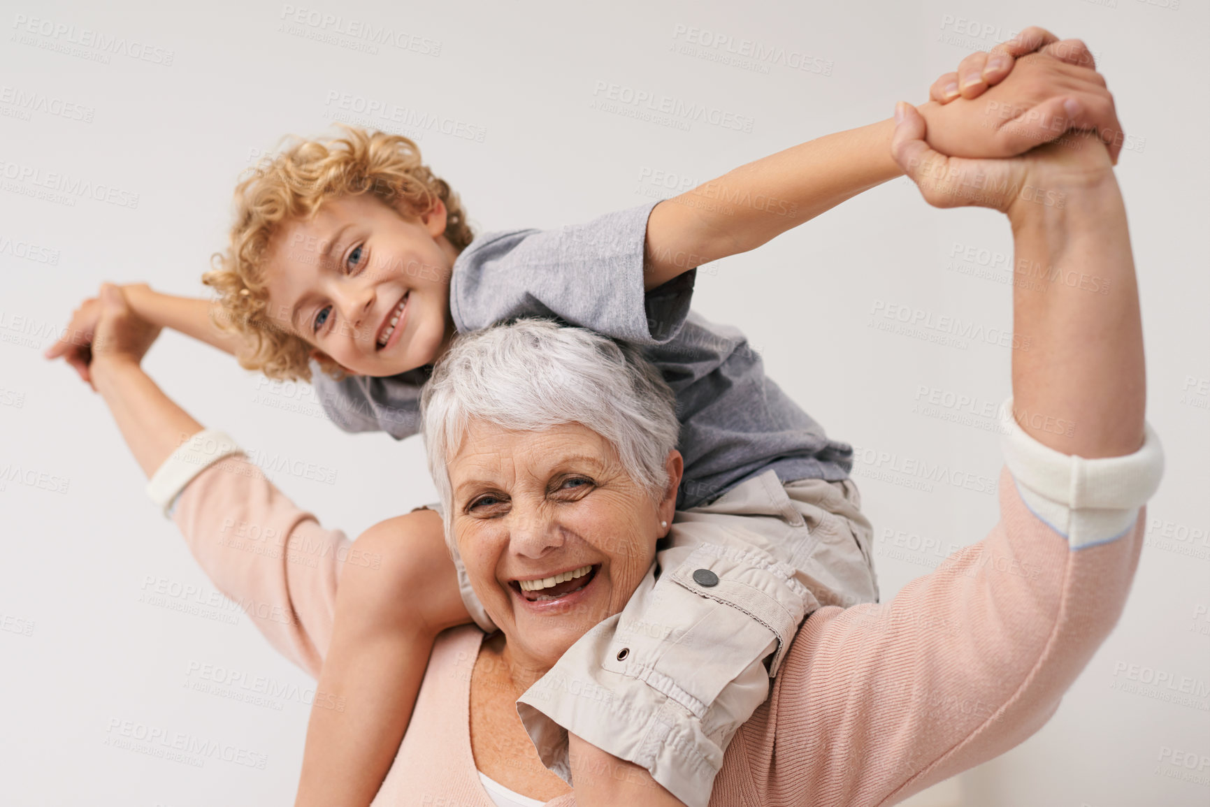 Buy stock photo Portrait, piggyback or happy grandmother with a child playing or hugging with love in family home. Elderly grandma, kid or old woman relaxing, bonding or enjoying quality time together in retirement