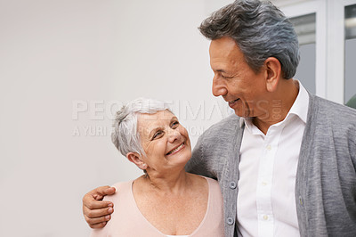 Buy stock photo Love, senior or couple hug to relax in home living room for bonding together with support or smile. Retirement, happy people or romantic man with an elderly woman for trust, peace or care in marriage