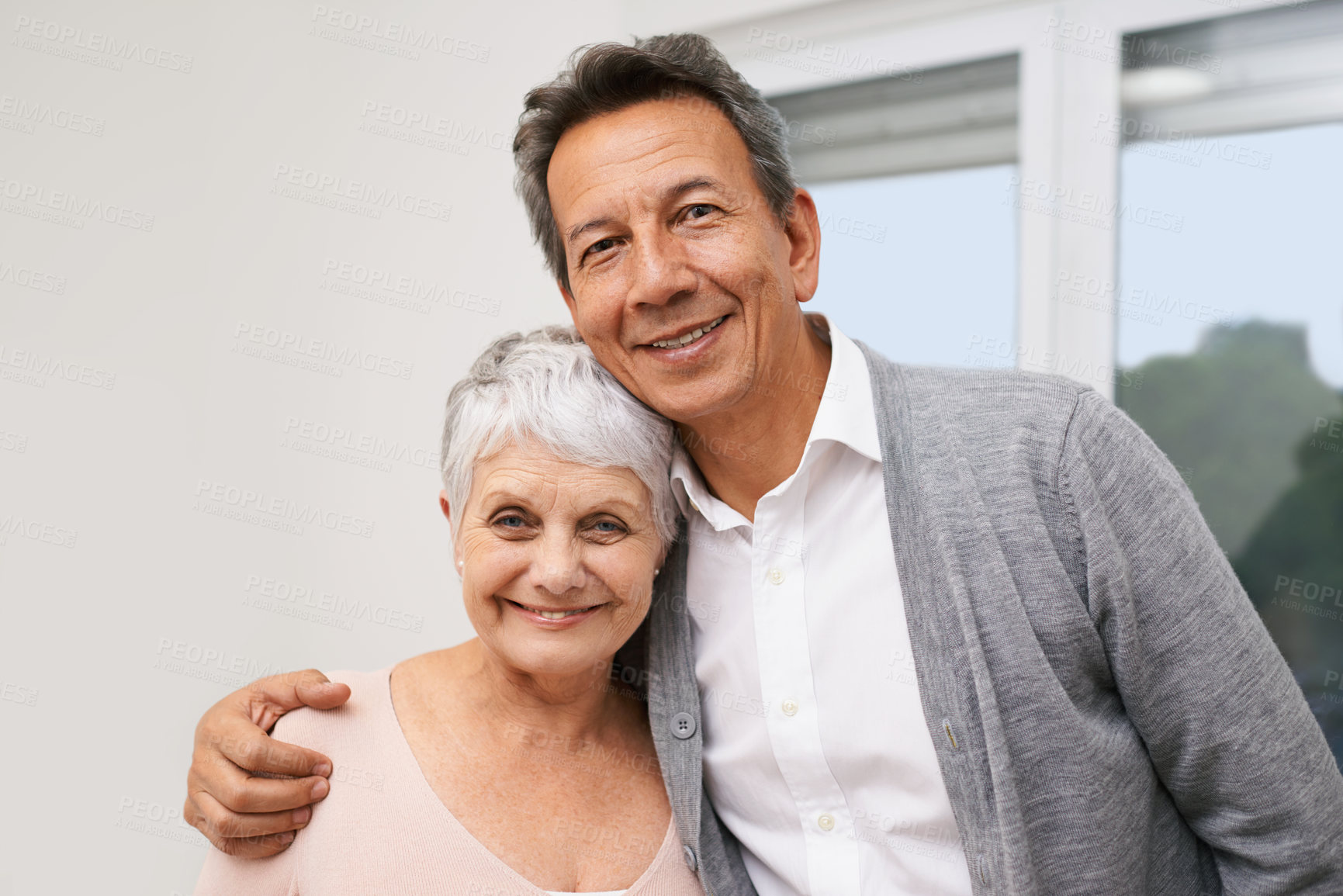 Buy stock photo Hug, senior or portrait of happy couple in home for bonding together with support, love or smile. Retirement, people or romantic mature man with an elderly woman for trust, peace or care in marriage