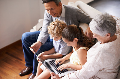 Buy stock photo Grandparents, laptop or children typing, learning how to type or playing online game in family home together. Education, child development or kids siblings on computer with grandmother or grandfather