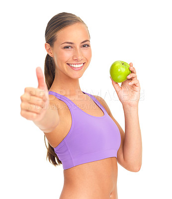 Buy stock photo Apple, thumbs up and fitness of woman in studio isolated on white background. Face, portrait and female model with hand gesture and fruit for healthy diet, wellness or nutrition, vitamins or minerals