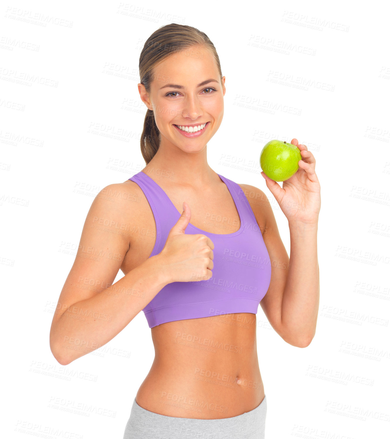 Buy stock photo Thumbs up, apple and fitness of woman in studio isolated on white background. Face, portrait and female model with hand gesture and fruit for healthy diet, wellness or nutrition, vitamins or minerals