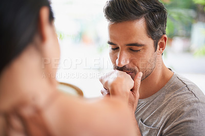 Buy stock photo Man, woman and kiss hand for love at restaurant date for marriage commitment, anniversary or celebration. Happy couple, together and honeymoon in Italy for relationship care, connection or bonding