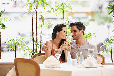 Buy stock photo Couple, restaurant and drinks with lunch, love and romance for anniversary or celebration. Woman, man and date with luxury, fine dining and smile for relationship on holiday or vacation with meal