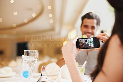 Buy stock photo Restaurant, couple taking picture and food with love and digital app with social media or happy. People, man and woman with smartphone or photograph with influencer or cafe for Valentines day or date