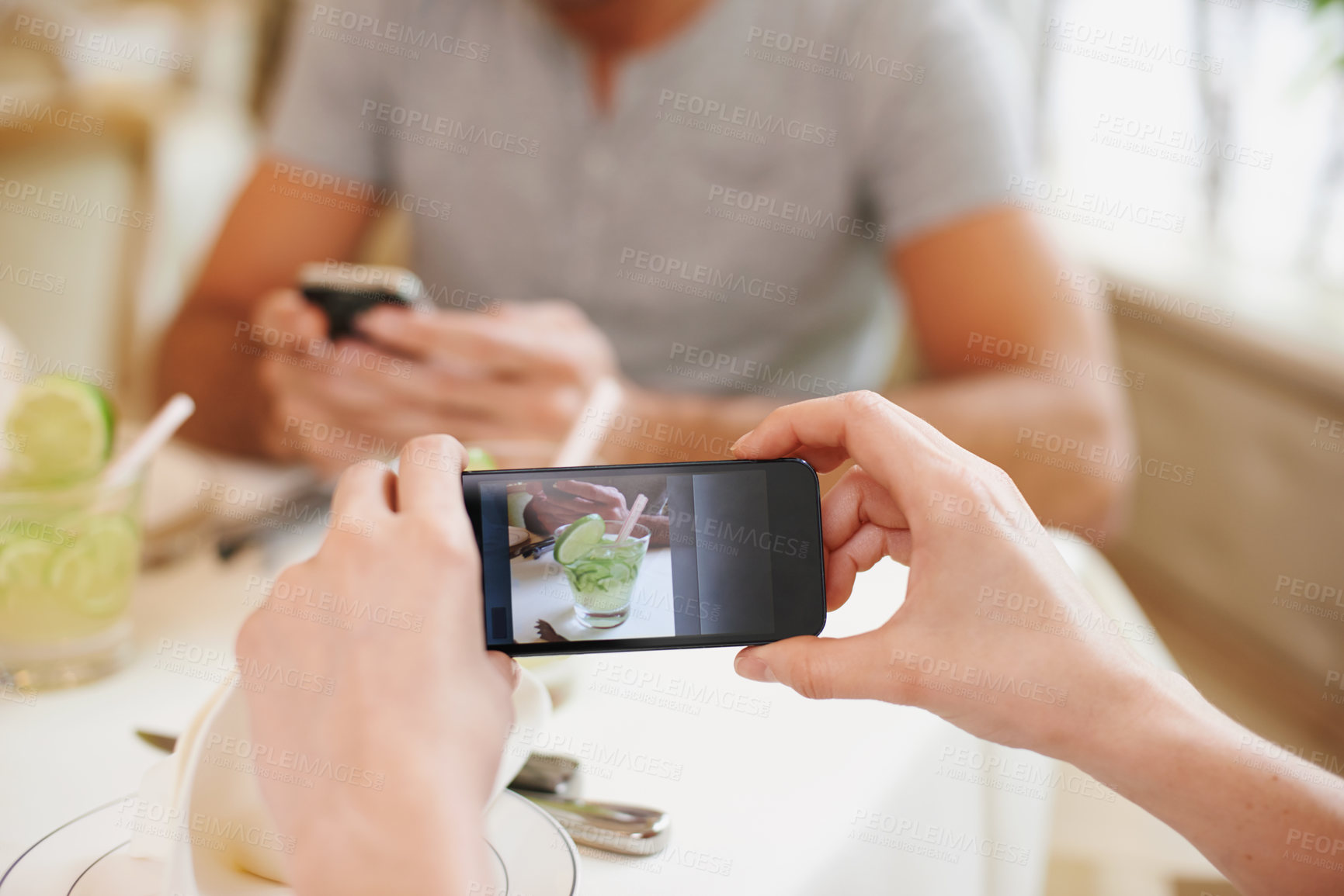 Buy stock photo Cafe, picture and couple with cellphone, screen and connection with Valentines day and photograph. Date, man and woman with smartphone and digital app for memory and romance with restaurant or luxury