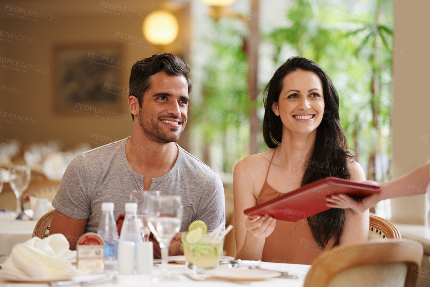 Buy stock photo Couple, restaurant and menu with dinner, romance and love for anniversary or celebration. Woman, man and date with luxury, fine dining and smile for relationship on holiday or vacation with meal