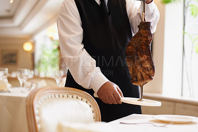 Buy stock photo Waiter, fine dining and beef with service, skewer and restaurant for dinner or lunch. Person, food and luxury with gourmet, meal and expensive cuisine with meat or protein on stake at elegant diner