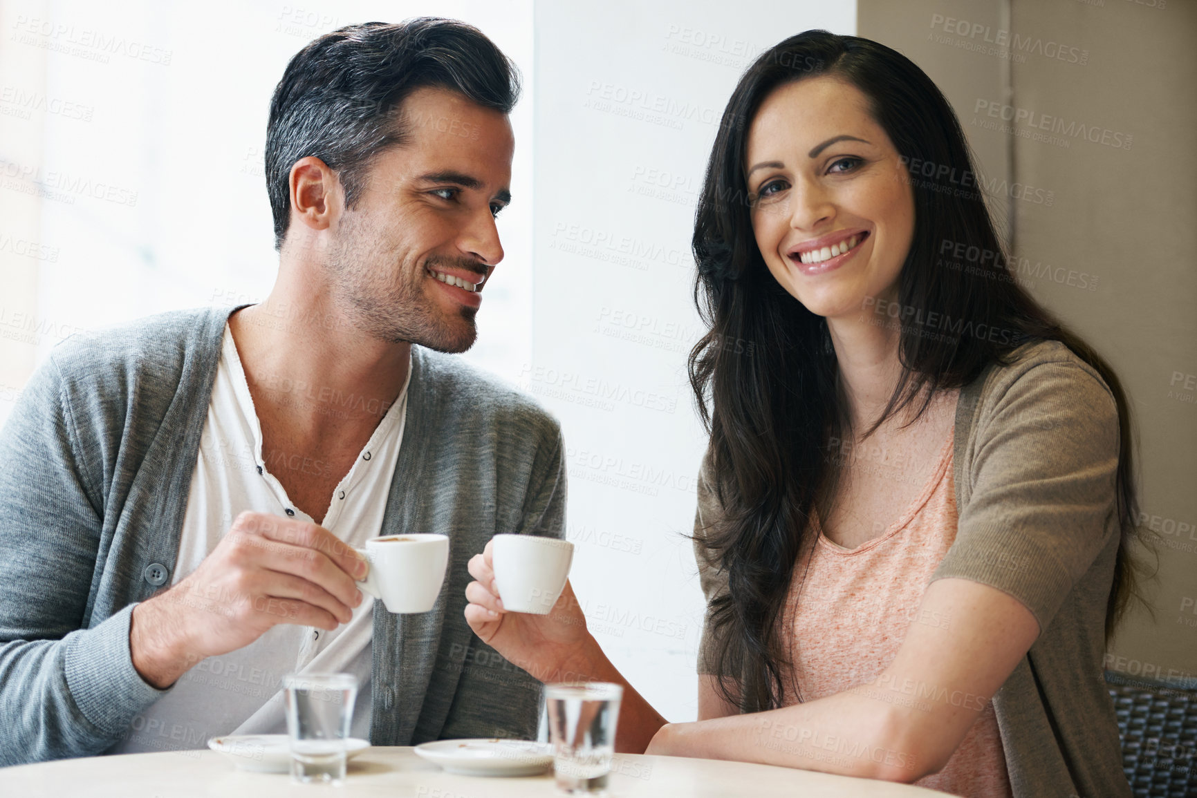 Buy stock photo Date, coffee and couple at cafe with portrait, happy and love together with smile and hot drink at a table. Espresso, morning and marriage at a restaurant with bonding, care and romance with tea
