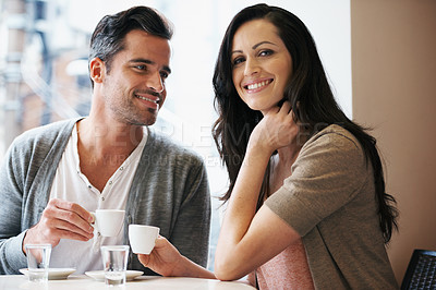 Buy stock photo Love, portrait and couple with coffee on date for romance or anniversary in cafeteria. Happy, bonding and young man and woman talking and drinking latte, espresso or cappuccino at restaurant.