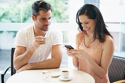 Buy stock photo Couple, coffee shop and woman or cellphone with online research on date together, espresso or social media. Man, female person and Italian restaurant for bonding communication, caffeine or internet
