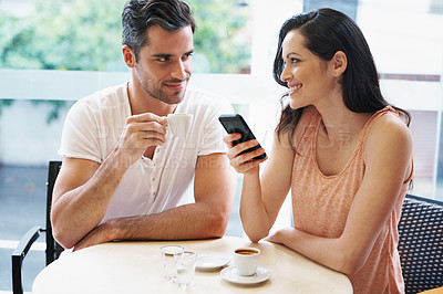 Buy stock photo Couple, coffee shop and woman with cellphone for texting on date together, espresso or social media. Man, female person and Italian restaurant caffeine for bonding communication, message or internet