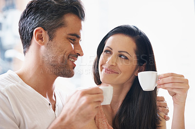 Buy stock photo Date, conversation and couple with coffee for romance, love or anniversary in cafeteria. Happy, bonding and young man and woman talking and drinking latte, espresso or cappuccino at restaurant.