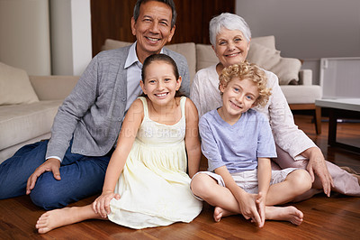 Buy stock photo Portrait, floor or happy grandparents with kids sit smiling together in family home in retirement. Senior grandma, smile or children siblings relaxing or bonding to enjoy quality time with old man