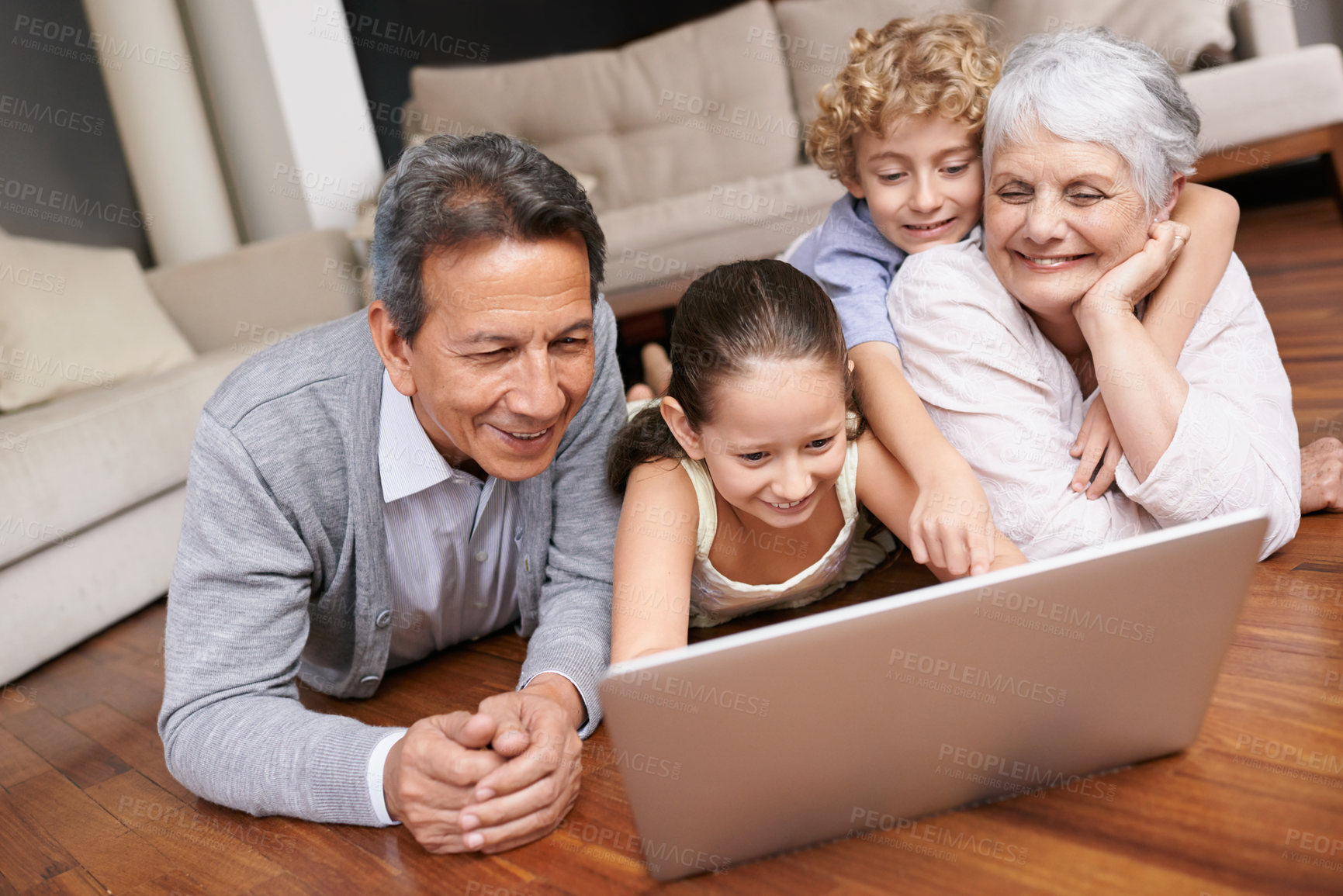 Buy stock photo Laptop, floor or grandparents with happy kids for movie streaming online subscription in retirement at home. Children siblings, relax or grandmother watching videos on internet with a senior old man