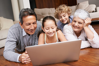Buy stock photo Laptop, relax or grandparents with happy kids for movie streaming online subscription in a family at home. Children siblings, floor or grandmother watching videos in retirement with a senior old man