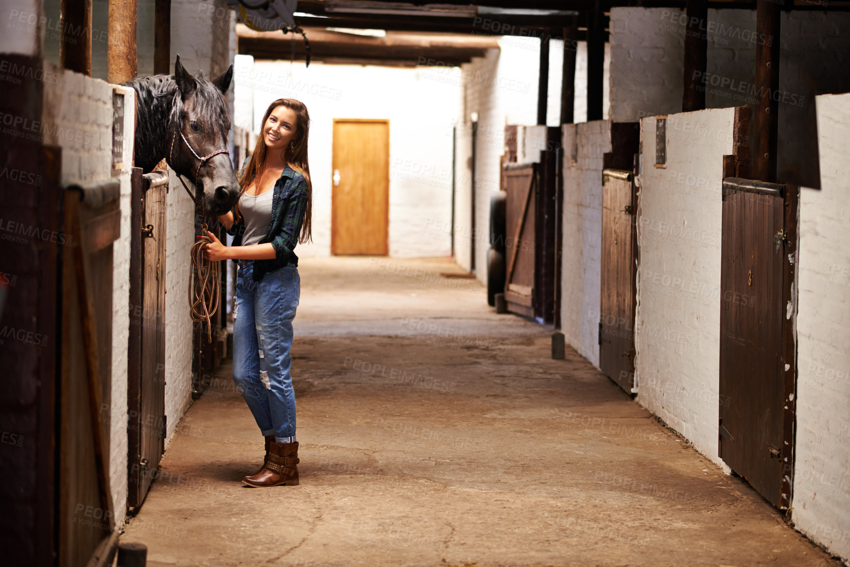 Buy stock photo Woman, portrait and happy with horse in stable for bonding, sports training and recreation in Texas. Stallion, person and animal or face in barn with smile for healthy livestock, hobby and pet care