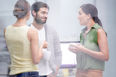Buy stock photo Team, meeting and coffee break for idea, gossip and company career as software developers in window. Professional male person, women and discussion in office and group listening to conversation