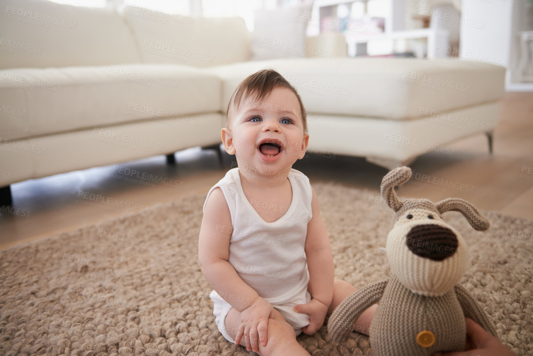 Buy stock photo Baby, teddy bear and toy on living room floor or morning playing in home for resting development, childhood or happiness. Kid, boy and lounge in apartment by couch for weekend joy, fun or relaxing