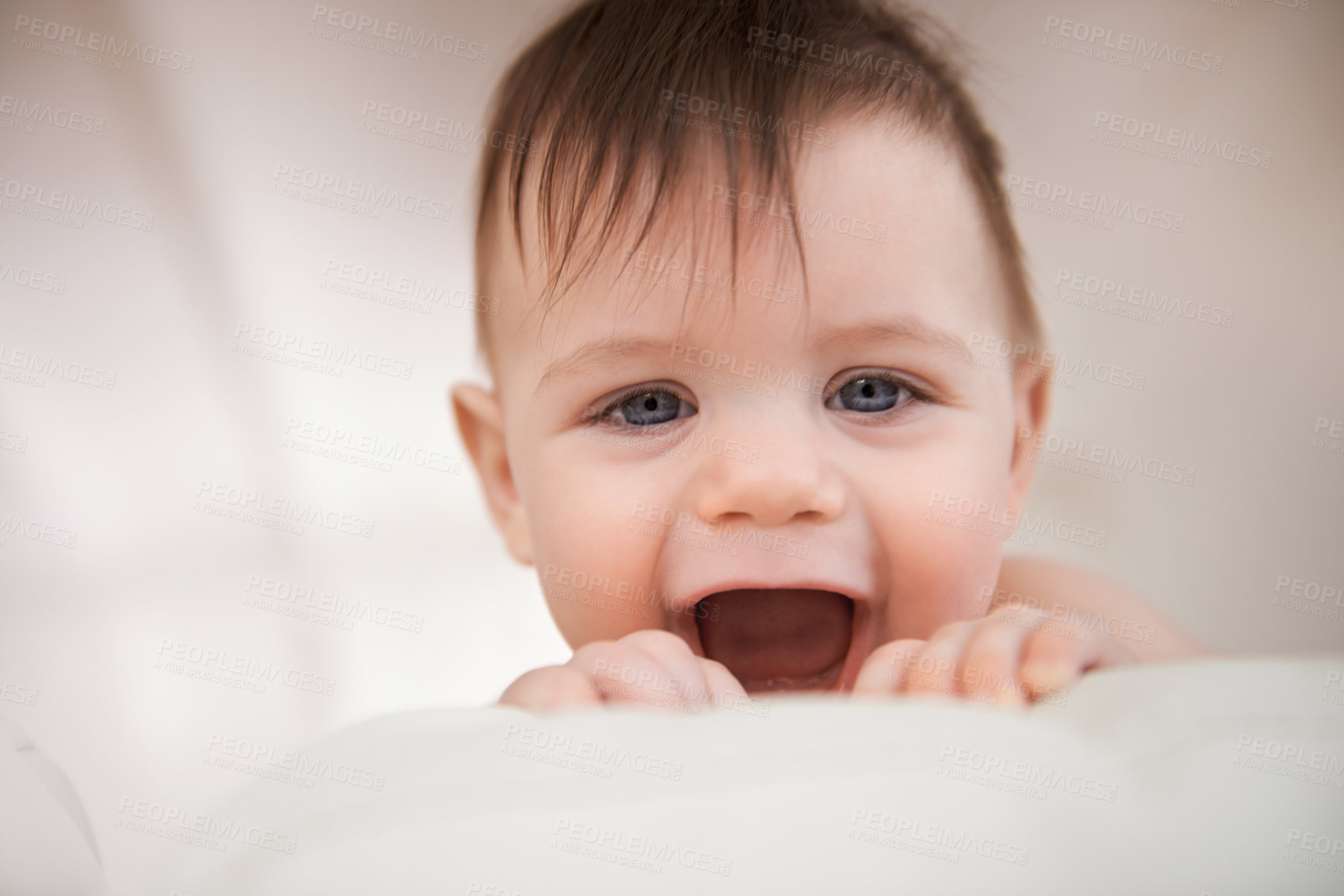 Buy stock photo Baby boy, excited smile and happy for play, growth and development for childhood. Adorable infant, young and healthy kid at home with face expression, learning motor skills and comfortable in house