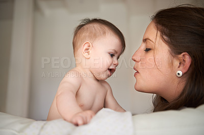 Buy stock photo Mother, baby and love connection in home with parenting bonding on bed for childhood development, support or safety. Kid, female person and together for young nurture or nursery, relax or security