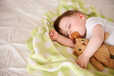 Buy stock photo Infant, sleep and bed with teddy bear in bedroom to rest, relax with dummy and dream. Home, toddler and afternoon nap for child development, growth and innocent baby, peace and bedtime with routine 
