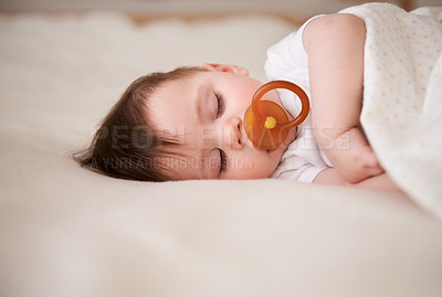 Buy stock photo Cropped shot of a baby boy sleeping peacefully