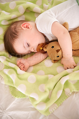 Buy stock photo Baby, sleeping and home with teddy bear, nap and nursery with peace in a bed with blanket. Morning, youth and kid with dream of an infant with child development from rest in a bedroom with a newborn