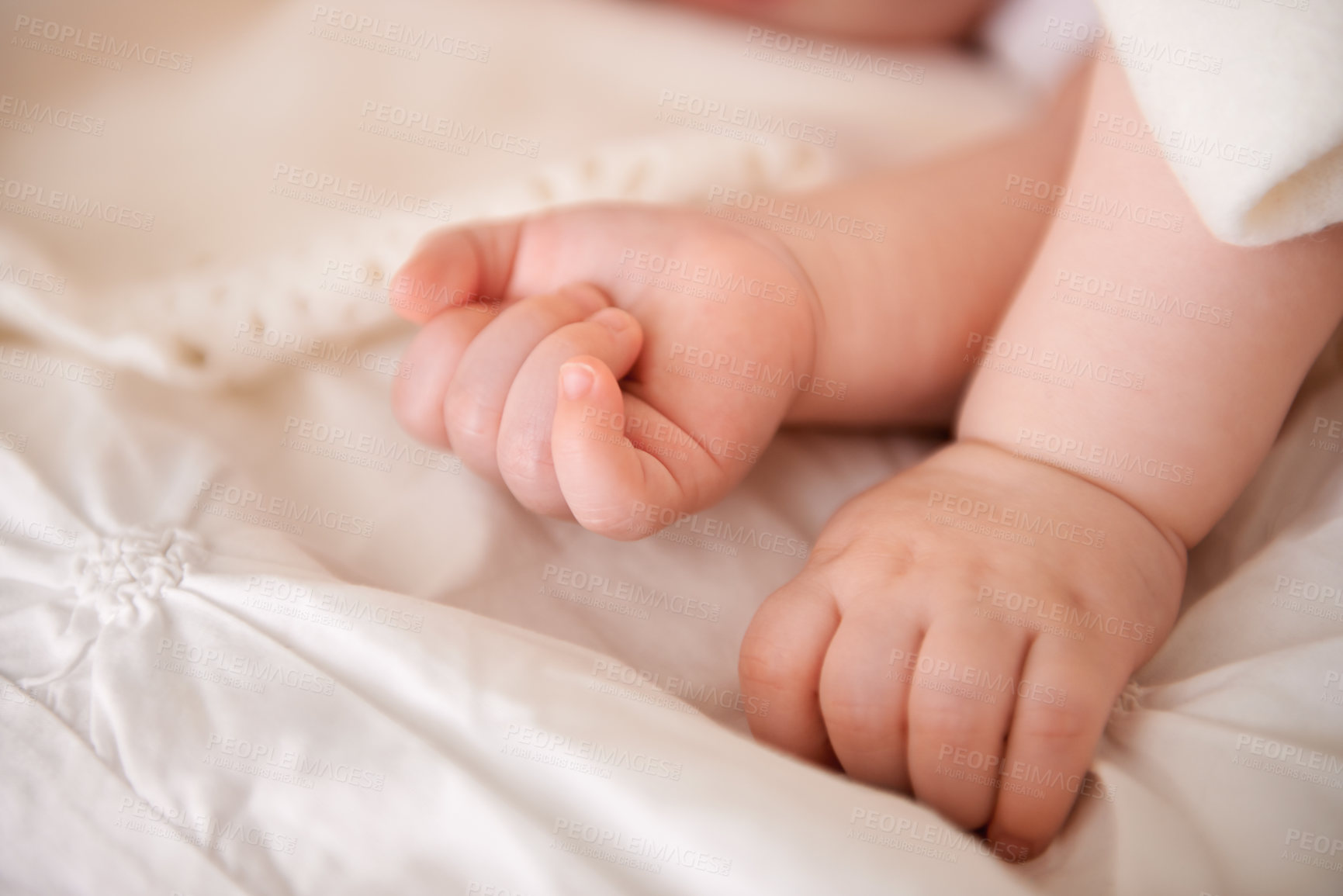 Buy stock photo Baby, hands and fingers on bed as closeup for childhood development or nursery sleeping, relax or resting. Kid, wellness and childcare in home for wellbeing nap or dreaming nurture, caring or calm