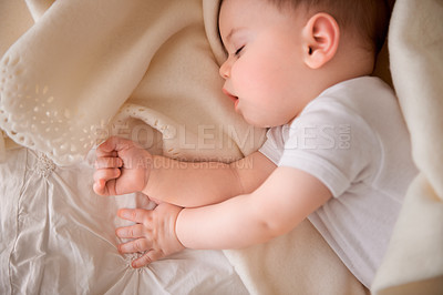 Buy stock photo Baby, sleeping and tired at home with relax, nap and nursery with peace in a bed with blanket. Morning, youth and kid with dream of an infant with child development from rest in bedroom with newborn
