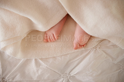 Buy stock photo Baby, feet and toes or blanket on bed for childhood development or nursery sleeping, relax or resting. Kid, wellness and childcare as closeup for wellbeing nap or dreaming nurture, caring or calm