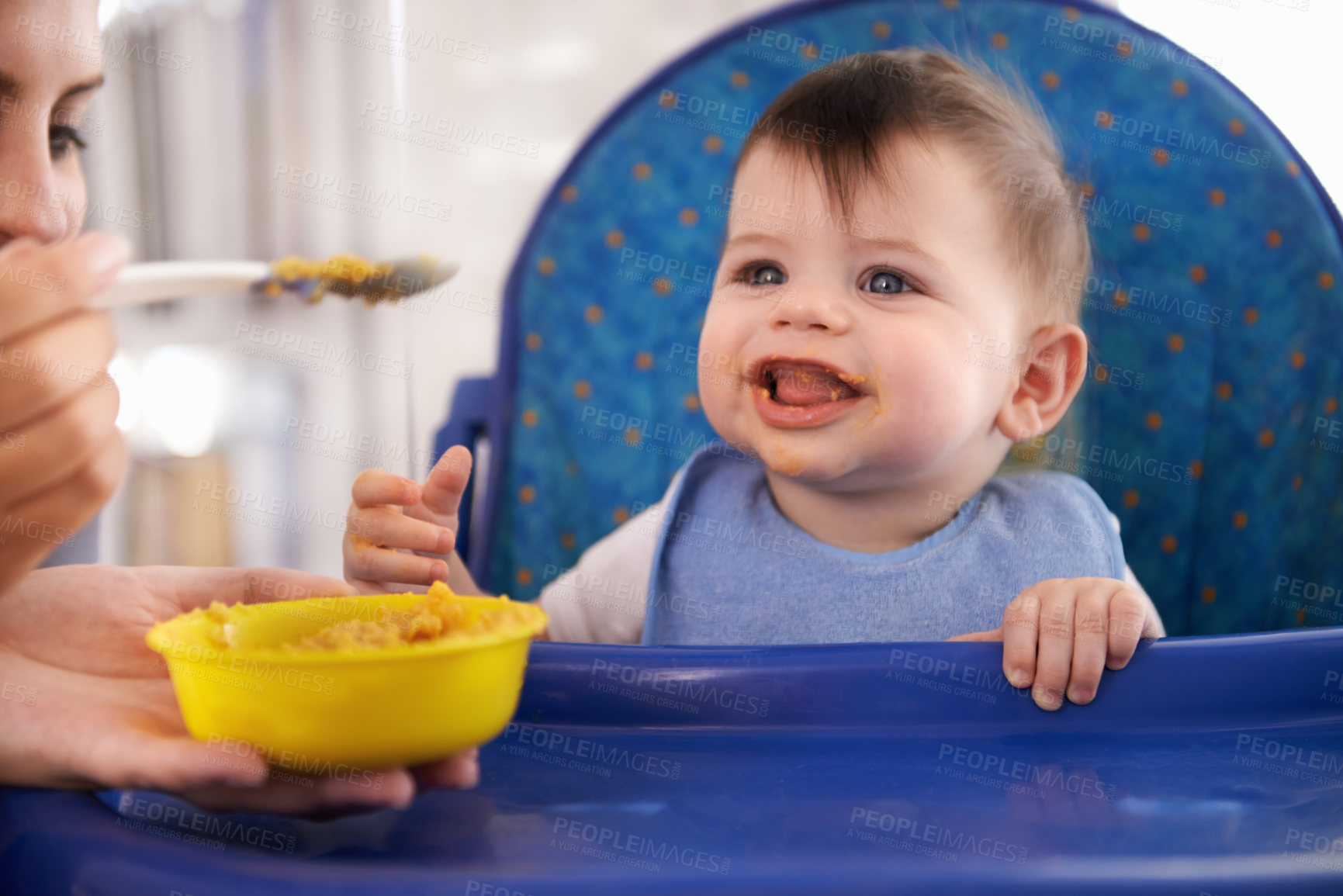 Buy stock photo Baby, parent and spoon for feeding food in chair for morning nutrition in apartment for breakfast, development or lunch. Kid, childcare and fingers for toddler dinner or wellness, hungry or vitamins
