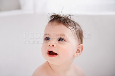 Buy stock photo Happy, cute and baby in bathtub at house for infant hygiene, health and wellness routine. Sweet, smile and adorable young boy toddler, child or kid washing body for clean skin in bathroom at home.