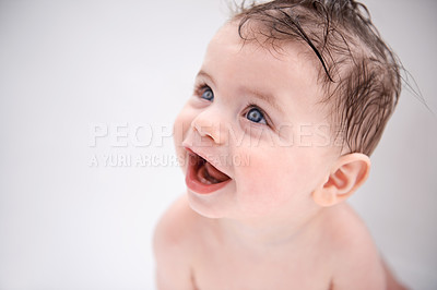 Buy stock photo Sweet, cute and baby in bathtub at house for infant hygiene, health and wellness routine. Happy, smile and adorable young boy toddler, child or kid washing body for clean skin in bathroom at home.
