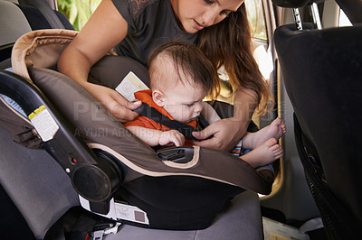 Buy stock photo Mom, baby and car seat in motor vehicle for child safety with buckle or strap. Mother, infant and protection, travel and parenting for secure transport to fasten or latch with love and harness