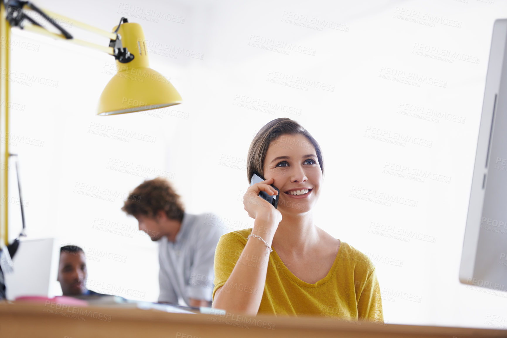 Buy stock photo Businesswoman, thinking and phone call in office by desk, communication and networking with ambition in career. Entrepreneur, smartphone and happy with planning and talking of deal in small business