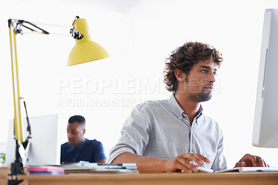 Buy stock photo Computer, serious and business man programming, working or planning project in creative startup office. Desktop, professional and developer at table for information technology, software and coding