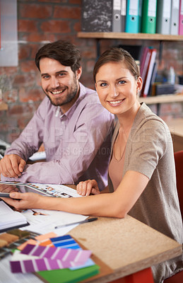 Buy stock photo Shot of a young creative professionals working in an office