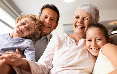 Buy stock photo Portrait of grandparents with their grandchildren at home