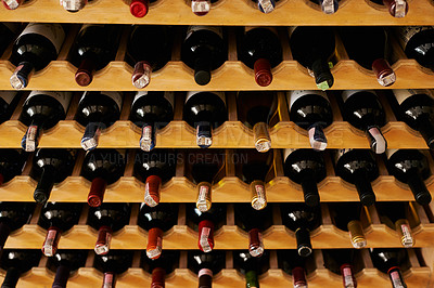 Buy stock photo Wine cellar, bottle and storage on rack in vineyard for restaurant stock, winery and shelf with alcohol display. Warehouse, drinks collection and beverage stack in basement with arrangement and row 