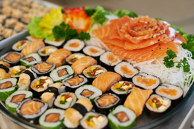 Buy stock photo A selection of sushi arranged on a platter
