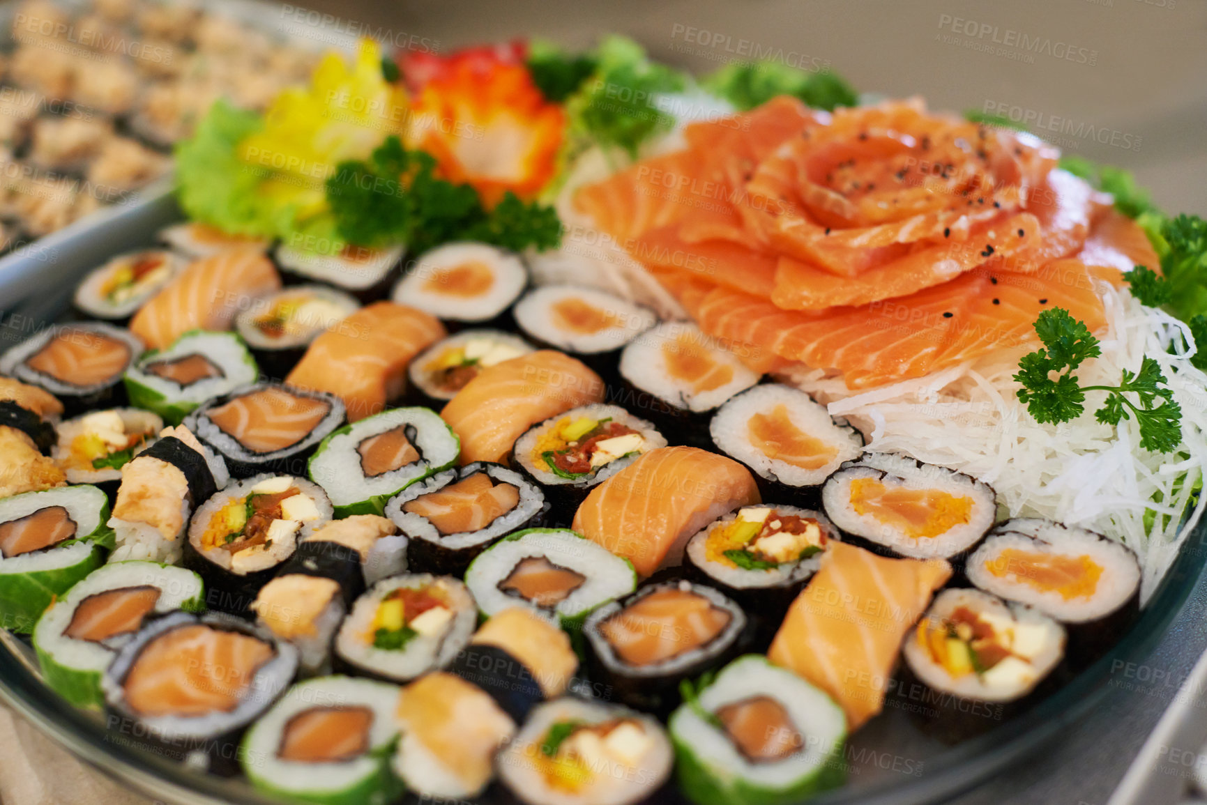 Buy stock photo A selection of sushi arranged on a platter