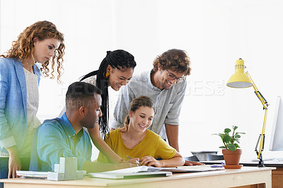 Buy stock photo Diversity, happy business people and writing in meeting for collaboration, planning or strategy at the office. Group of diverse employees working on paperwork, documents or brainstorming at workplace