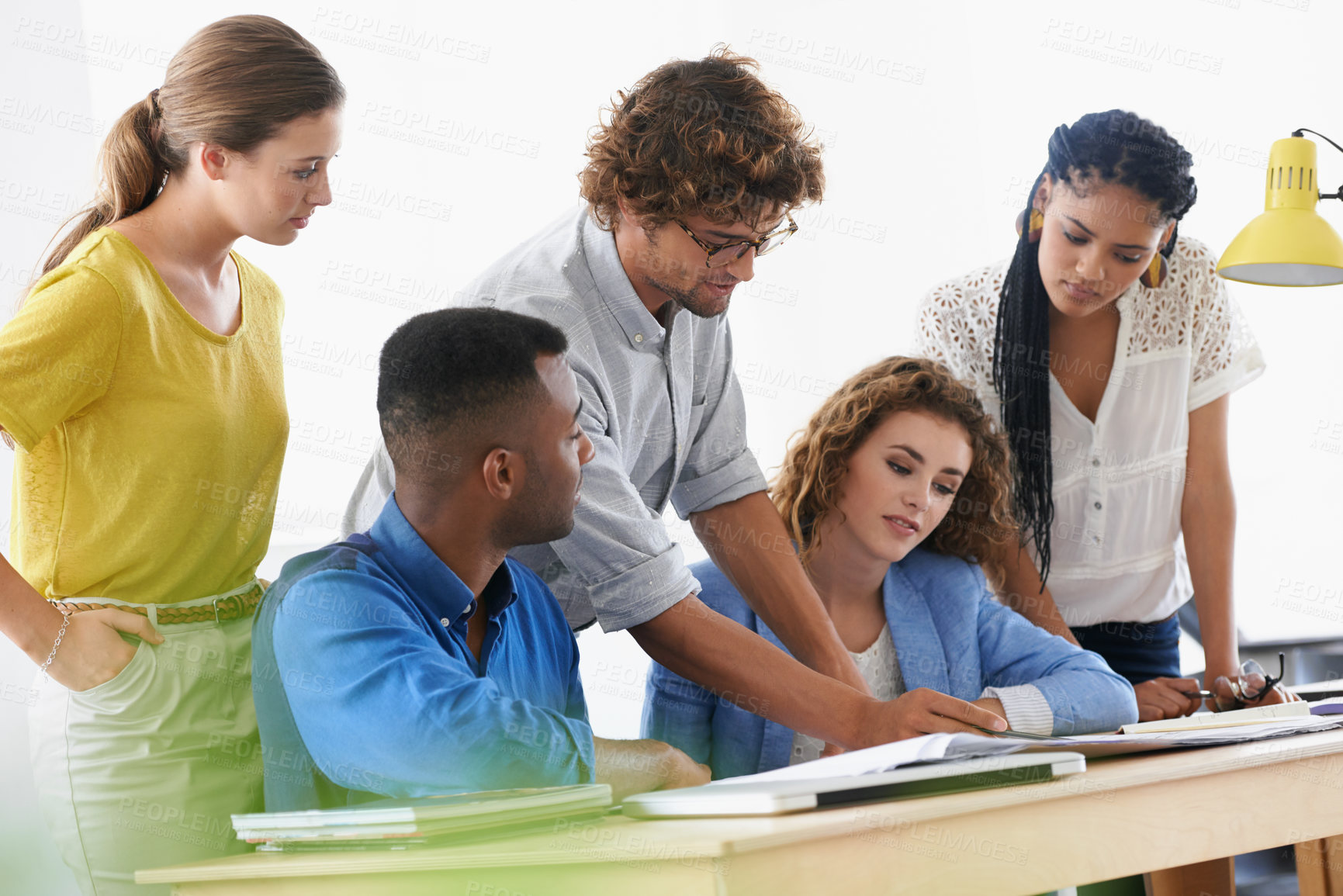 Buy stock photo Businessman, coaching and documents in teamwork planning for strategy and collaboration at office. Business people listening to help or mentor training staff in diversity group project at workplace