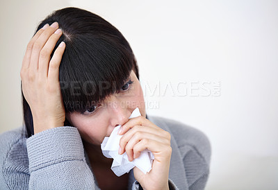 Buy stock photo woman blowing her nose