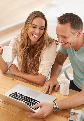 Buy stock photo Business people, partner and laptop laughing together for online meme, social media or reading funny news. Happy woman with man or clients at tablet with coffee cup or tea for networking on computer
